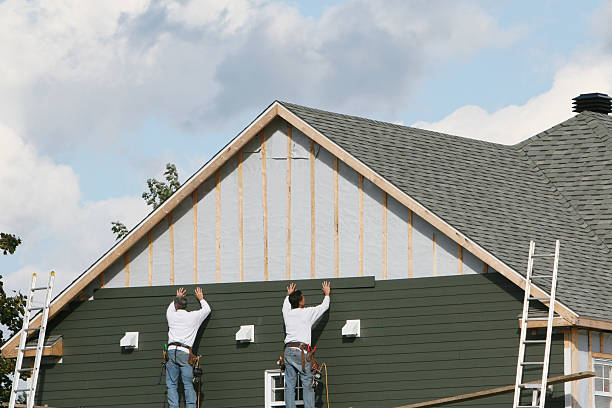 Professional Siding Contractor technician working in Wilmington, NC